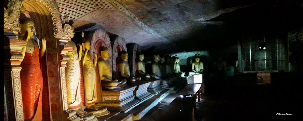 Buddha Statues in Cave 2 and Water Vessel Dambulla