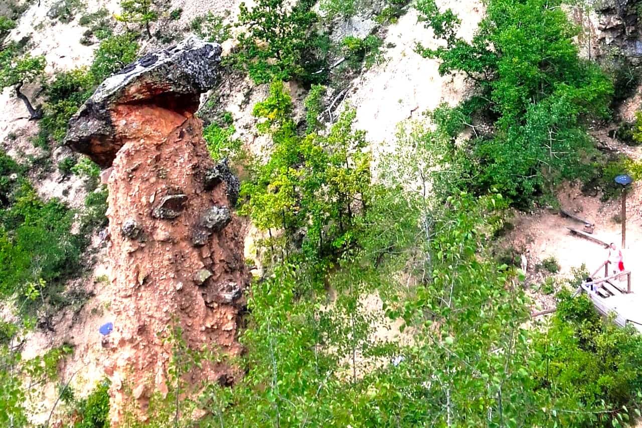 One soil figure with cup in the Devil's town