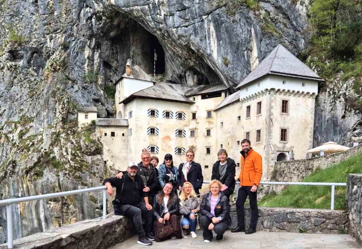 In front of the Predjama Castle